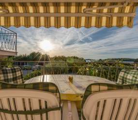 Apartments Fiorela / Two-bedroom apartment with balcony, parking, and sea view